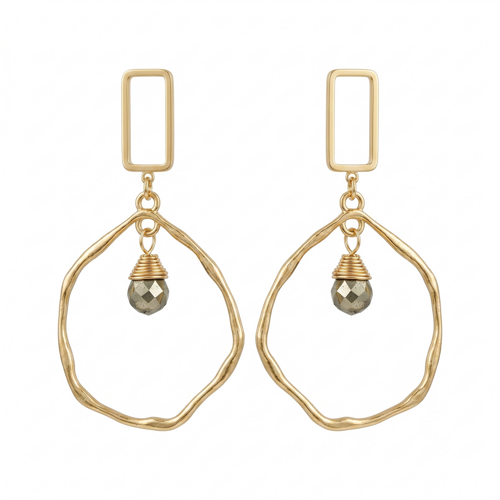Sand and Sea gold-tone geometric drop earrings with faceted pyrite stone accent, wire-wrapped detail.