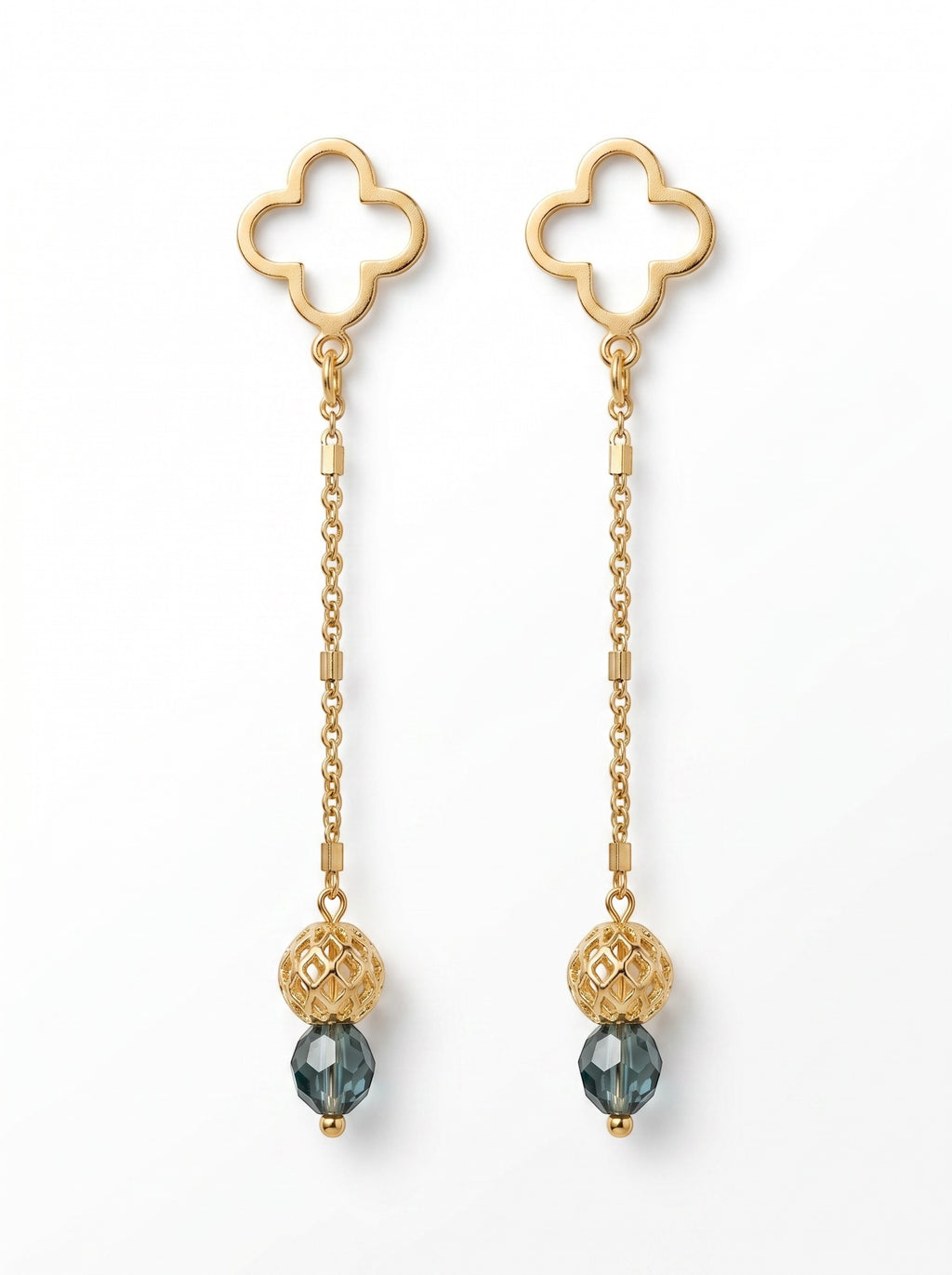 Sand and Sea gold-tone drop earrings with clover studs, chain, and blue gemstone accents.