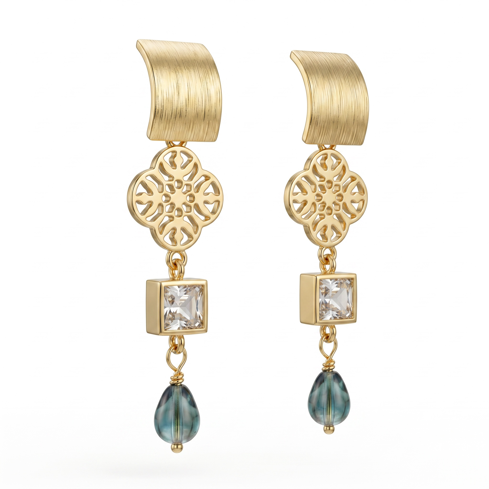 Sand and Sea gold-plated dangle earrings with quatrefoil charm, princess-cut cubic zirconia, and blue-green teardrop bead.
